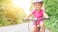 Happy child riding bike