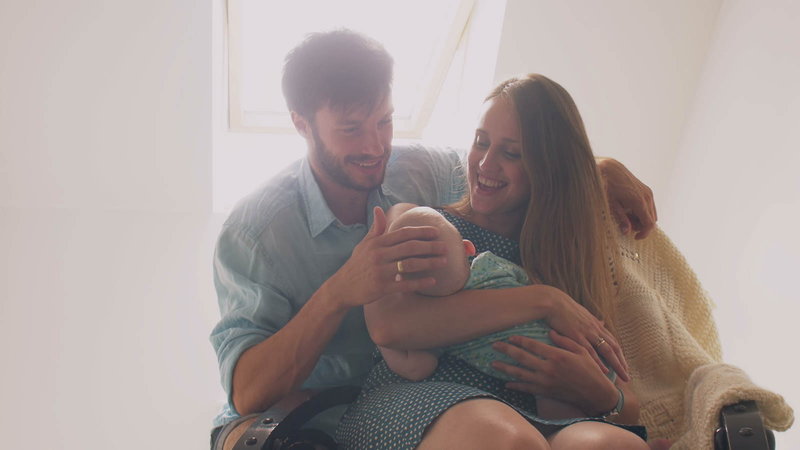 Couple holding baby