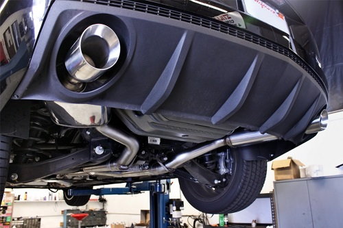 The exhaust system weights nearly 80 pounds