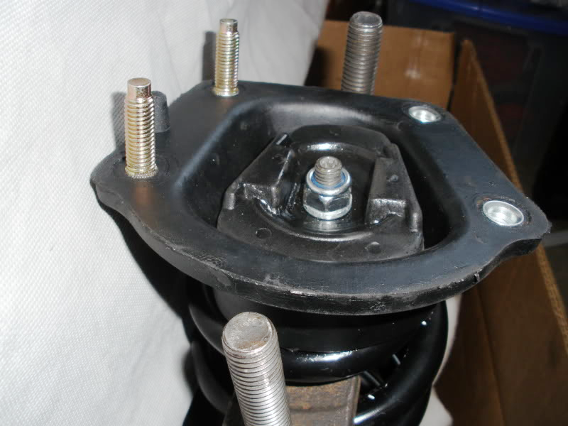 Upper shock mount nut, and studs