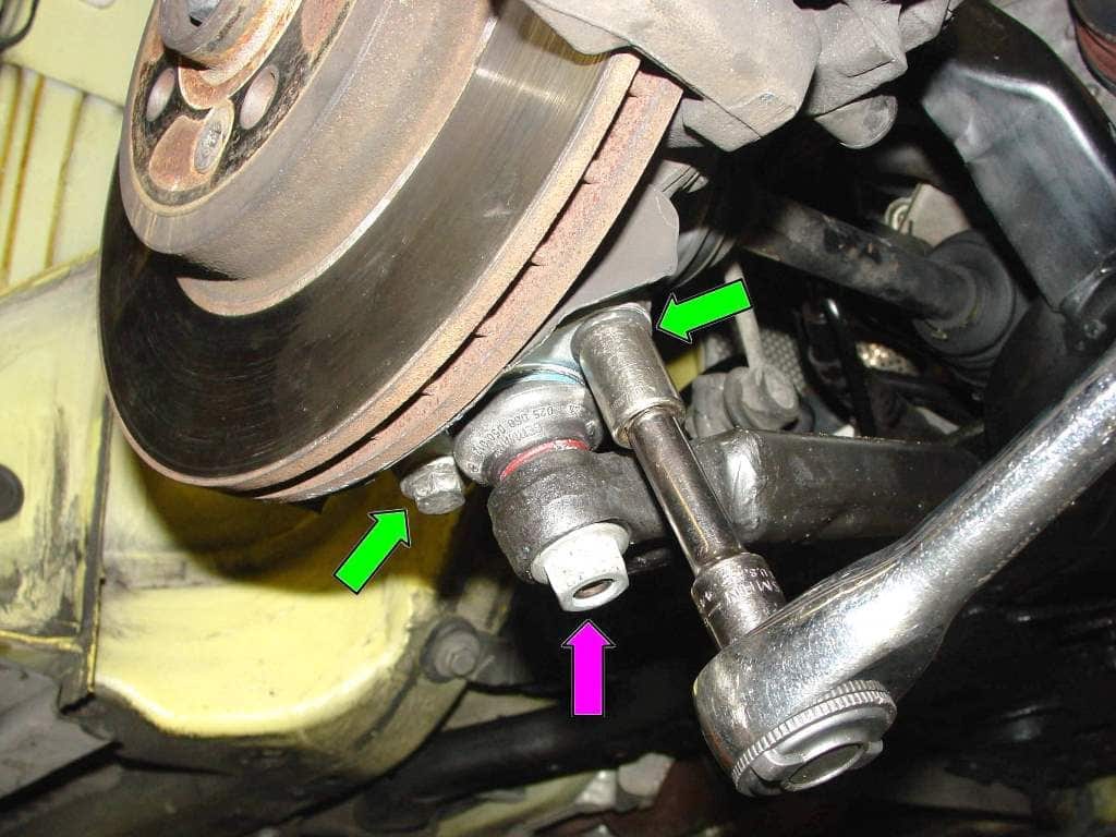 Just these three bolts hold the outer ball joints in place