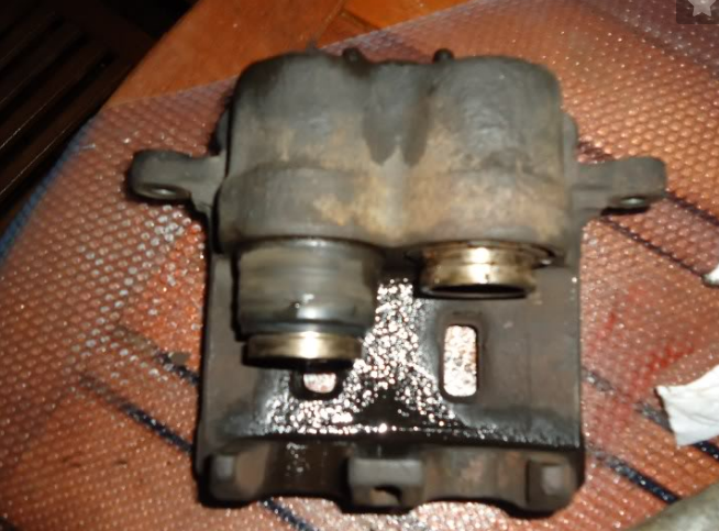 mini cooper brake fluid pad rotor caliper piston seals rebuild problem issue issue how to DIY diagnose