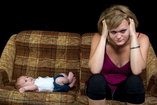 new mother struggling with postpartum depression