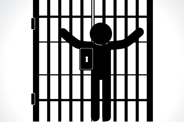 person behind bars
