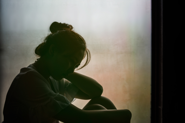 sober woman grieving during recovery