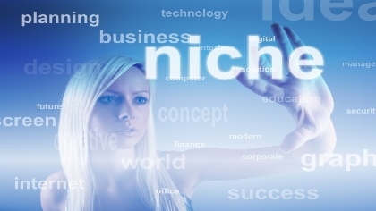 A woman looking at business terminology.