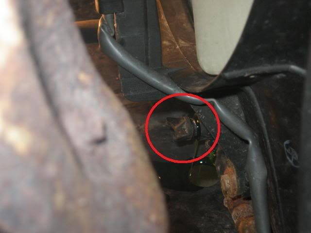 Drain plug on the right bottom side of radiator if you're facing the truck