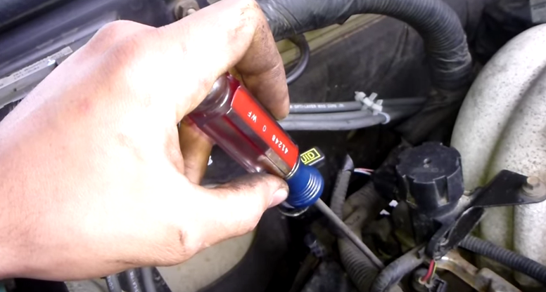 Testing fuel injectors with screwdriver