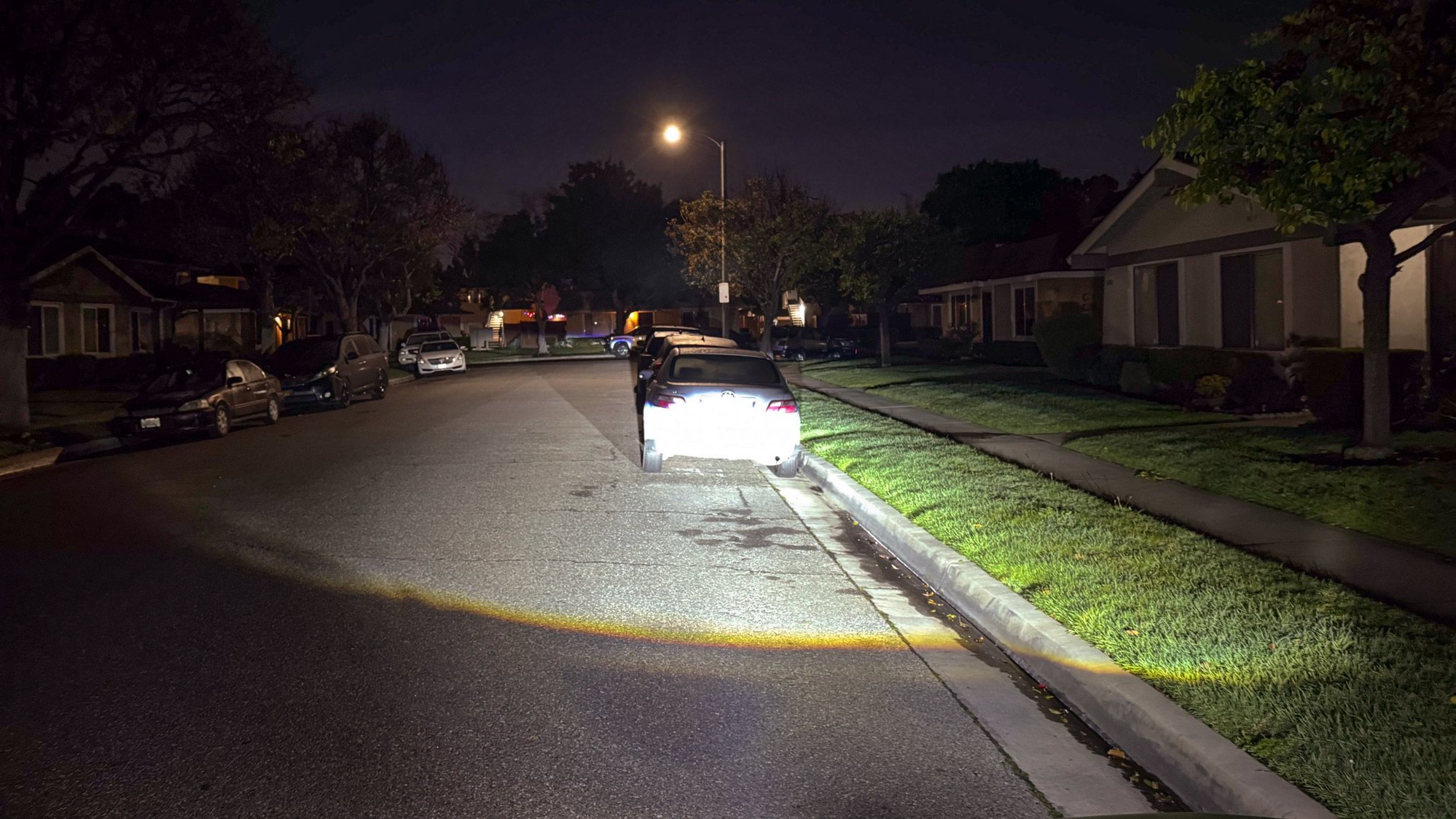 Retrofitted: Focused down-road output, cutoff below windows and mirrors.