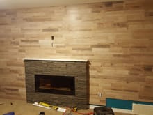 Pics don't do the wall justice.. the texture of the flooring looks real and you cant see the laminate joints due to the color of the lines.. they blend in with the rest