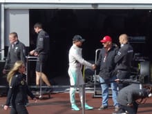 Nico comes out and shakes Lauda's hand (after running up and down the stairs next to Hamilton's garage about a dozen times)