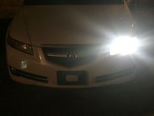 This is a photo of the headlights on the "high beam" setting.  It seems to be a little brighter on the photo.