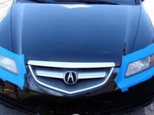Blue painter's tape eyeliner, for cleaning up the headlights
