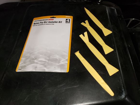 Make sure to purchase this $4.99 Harbor Freight Nylon Pry Bar Kit. Works great.