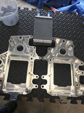 Had my intercooler plate openings enlarged to fit the intake manifold opening as well as the supercharger opening. Ty is will lessen restriction.