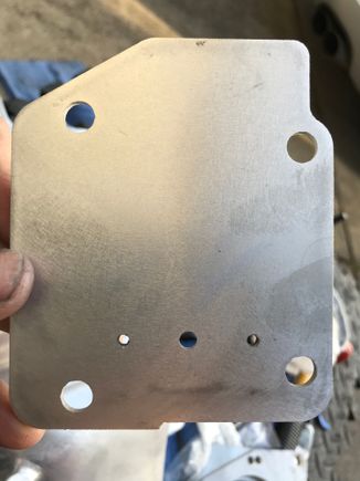 I bought a Pranks adaptor kit. Here is the Intake manifold block off plate.

There are three random holes that need to be TIG welder to fix their error.