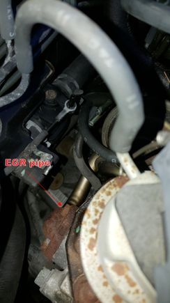 You can see a rubber hose from EGR valve. Disconnect that.