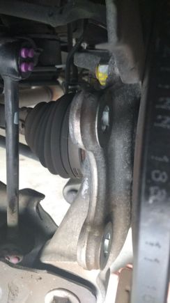 Washer between the caliper mount bracket and the actual caliper