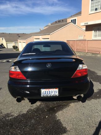 No scratch on the lower left bumper. It's a reflection from the floor