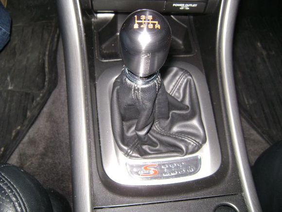 Skunk2 weighted titanium shift knob.