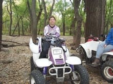  my girlfriend on her 250 trail boss i fixed up for her. it has a new motor and she wanted it purple.                                                                                                   