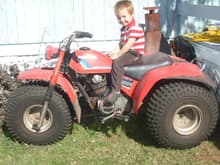 this is my old 3 wheeler its a 85 honda 200s before pic of it lol