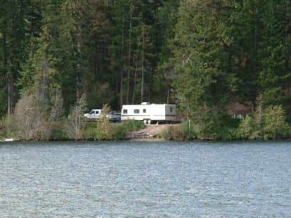 this is our camp site right on Osprey Lake with nobody else around, taken from the other side of the lake. Beautiful, private spot. swimming, fishing.