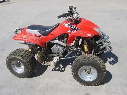 2007 Jetmoto 250...Only real mods on this are the aluminum foot pegs and the repaired swing arm...It broke on my first ride over 2 yrs ago...Its when i figured out that Chinese quads werent for old expert level enduro riders..

My little bro's all love it...(little bros are between the ages of 32 and 47)