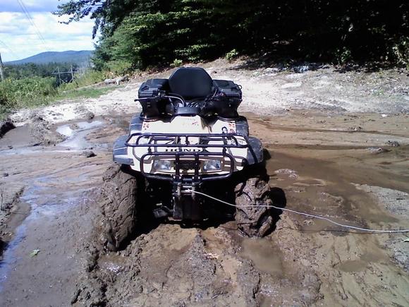 A little help from the best investment I ever added to my Honda... My warn winch. 4x4 was no help here, tires just spun in their own grave.