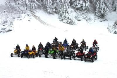 Puget Sound Area Riders members on an awesome snowy day near the top of Capitol Forest, WA.  Dec '03.I am second from front right.                                                                  