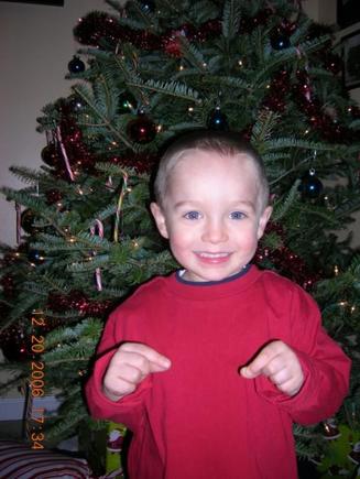 aaron moments before opening presents 
&quot;c'mon dad- no more pictures!!!&quot;