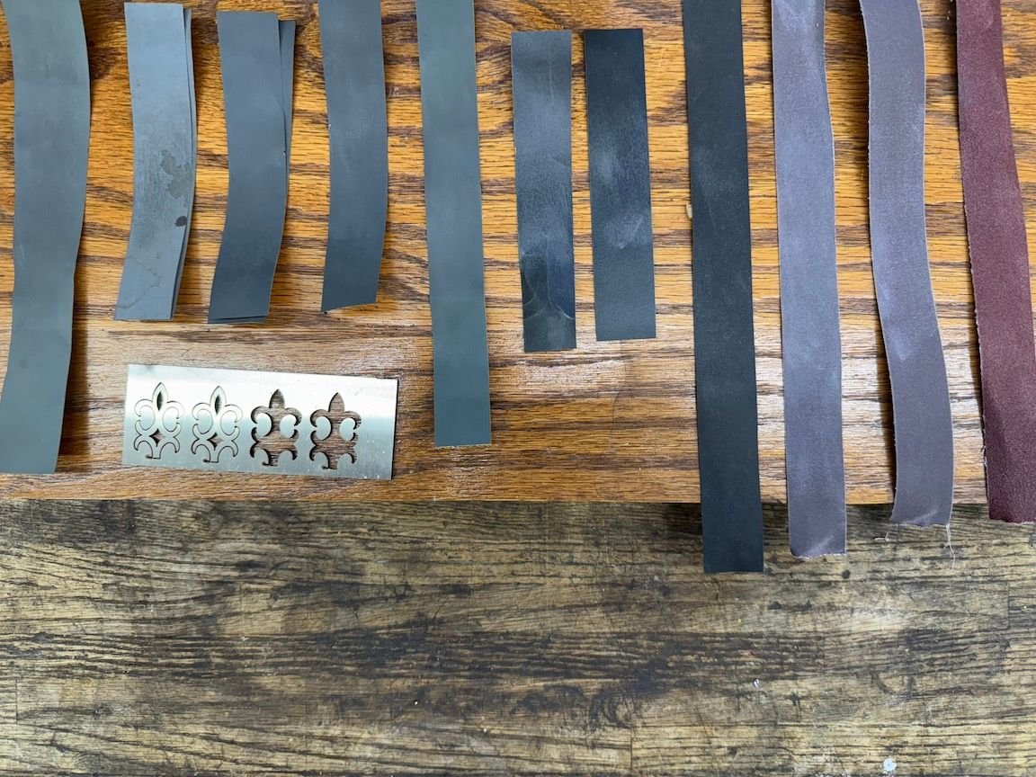 My progressively finer grits of sandpaper I used on the fork decoration