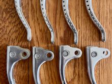 From top L-R:(1) pair of later Super Record type blades; (2) set of earlier Super Record blades; Bottom L-R: (3) set of Nuovo Record blades, (4) set of mismatched NR blades