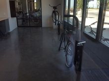 Bike repair station with what looks like a vending machine for repair parts.