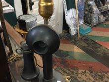Stopped in an resale shop.  Although repurposed into a lamp, this candlestick phone caught my eye 