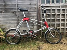 I have inherited this folding bike. Does anyone know what make it is or how much it is worth? The back of the saddle says, Madison.