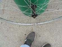 32 hole front wheel new LP18 rim, it needs a skewer  you will need a rear wheel and chain etc.  But I don't have one here at this time.  I think I can find a couple of cassets for you.