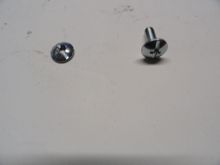 The original screw on  the right and prototype one on the left.