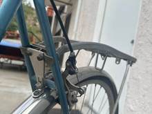 Hand made Pletscher rack support. I've put car batteries on this. I fondly remember the one time  I rode through Golden Gate Park with my girlfriend seated on it side saddle. 