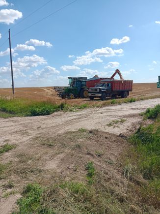 My Dad and Uncle living that old school farming life.  