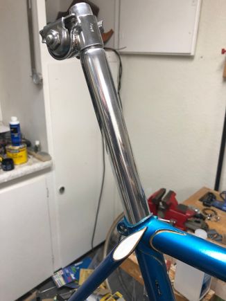 Original straight seatpost, with a Brooks clamp....
