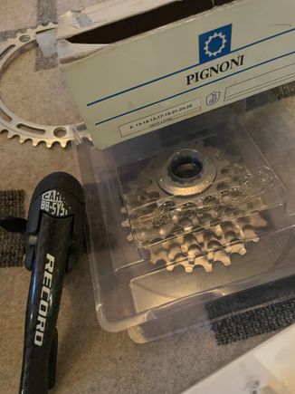 8 speed in the box. I suspect the brifter/shifters from our last visit pair with these. What am I to do with one record brift lever?? Dunno. 

Pinoni? Pine cone?