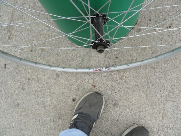 32 hole front wheel new LP18 rim, it needs a skewer  you will need a rear wheel and chain etc.  But I don't have one here at this time.  I think I can find a couple of cassets for you.