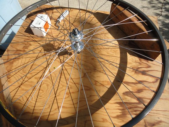 Finished lacing and the wheel is ready to go to the truing stand.  Total build time this morning with pictures was fifteen minutes.