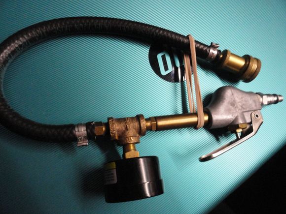 The tool with the air hose connector shown, and the look of the Milton air pressure tool with modifications.