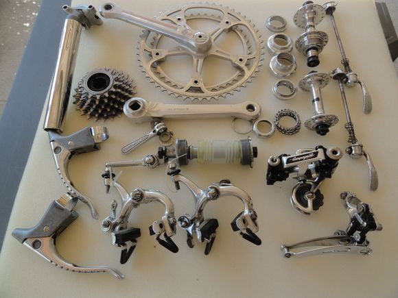 This group is complete sans pedals and hoods.  I got the group from a person retiring to Fla. and he couldn't keep it on a bike in a small condo.   Asking $900 for the set shipped to the lower 48 by USPS.  Some wear on brake blocks.   Seat post is 27.2,   hubs are 6spd, New Winner FW.  