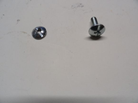 The original screw on  the right and prototype one on the left.