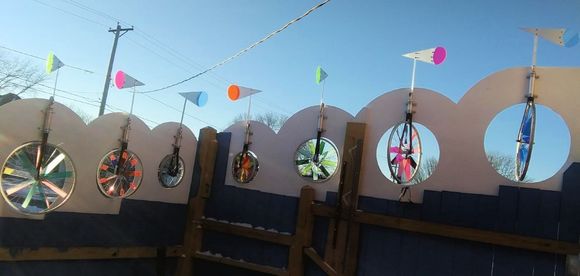 The inner side of the fence.