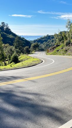 Another view on tge Claremont  climb with a peek-a-boo view of SF.