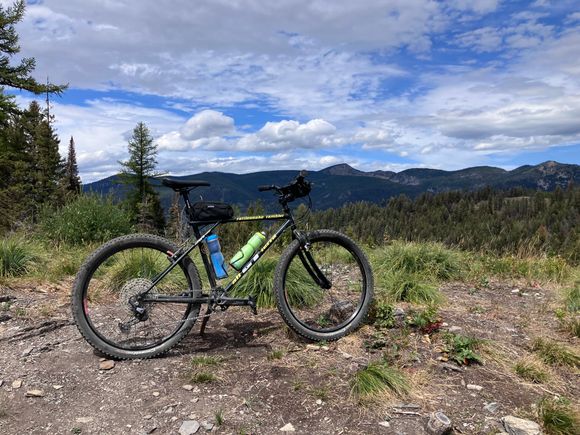 Old GT rescued from the trash heap. Powdercoated and outfitted with contemporary components. It gets used hard for actual MTB stuff. Voted most likely in my collection to brake a weld at some point. Probably in the 1” head tube.